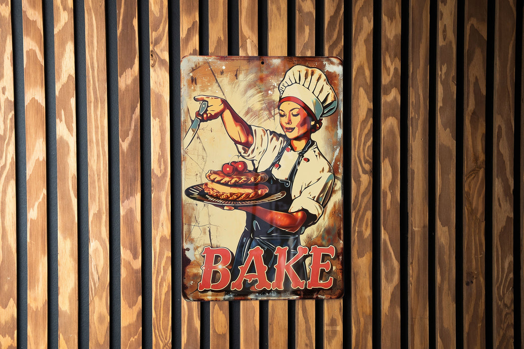 a sign on a wall that says bake