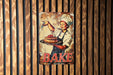 a sign on a wall that says bake