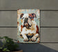 a painting of a bulldog on a rusted metal sign