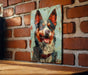 a painting of a dog on a brick wall