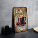 a metal sign that says cold and brew