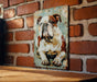 a picture of a bulldog on a brick wall