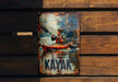 a picture of a man in a kayak on a wooden wall