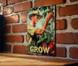 a picture of a man holding a plant on a brick wall