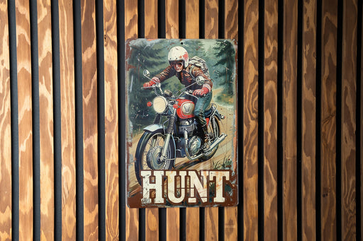 a painting of a man riding a motorcycle on a wooden wall