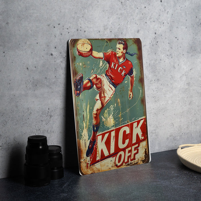 a vintage kick off sign sitting on a table
