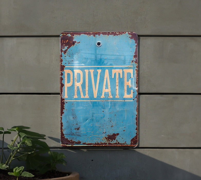 a blue sign that says private on it