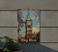 a big ben sign is hanging on a wall