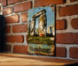 a picture of a stonehenge on a brick wall