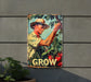 a sign on the side of a building that says grow