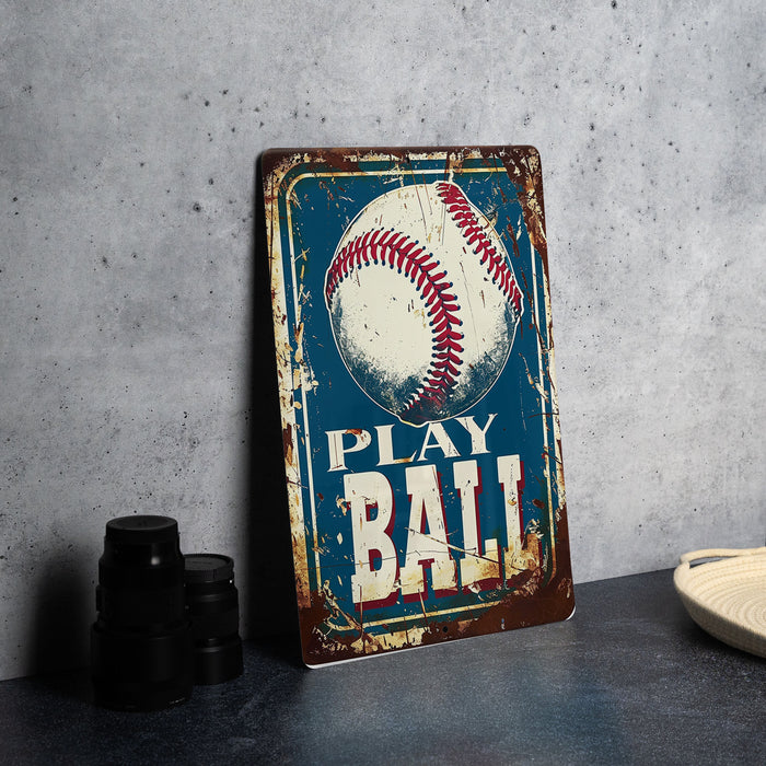 a metal sign with a baseball on it