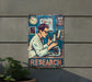 a sign on a wall that says research