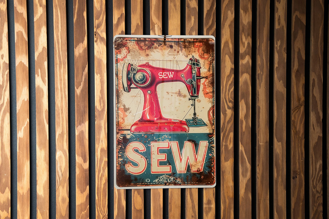 a sign that says sew on a wooden wall
