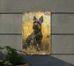 a picture of a dog is hanging on a wall