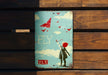 a metal sign with a girl holding a kite
