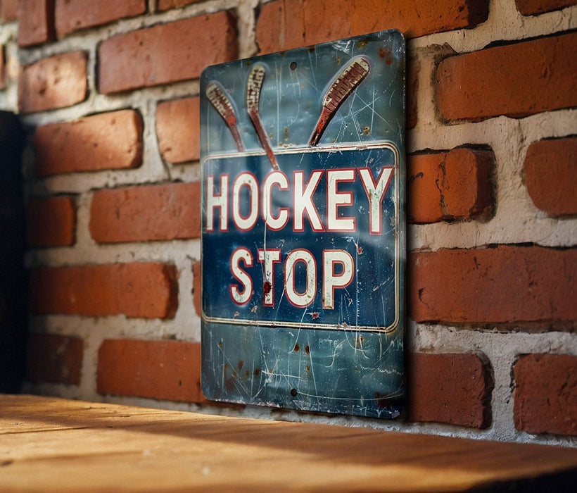 a sign on a brick wall that says hockey stop