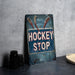 a sign that says hockey stop on it