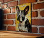 a picture of a dog on a brick wall