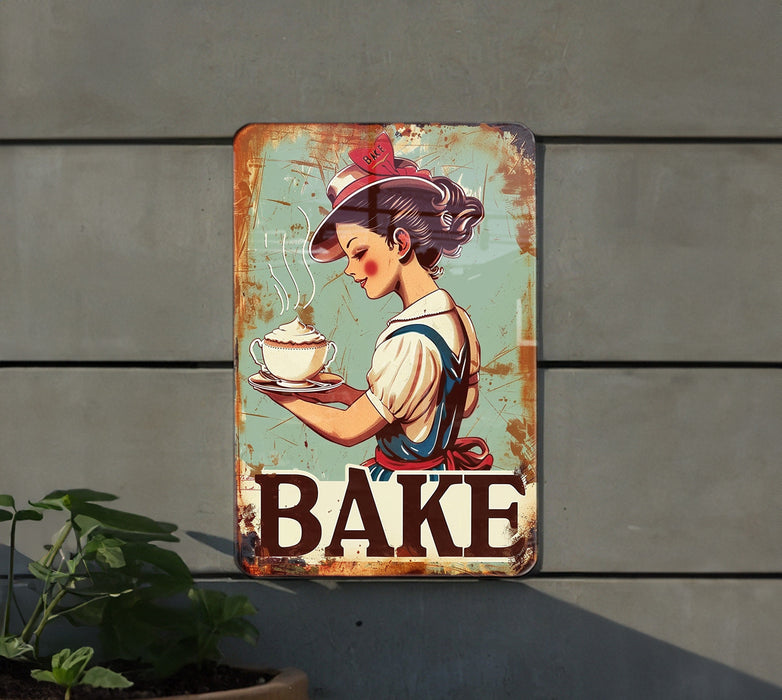 a metal sign with a woman holding a plate of cake