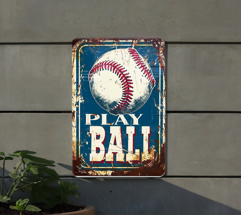a metal sign with a baseball on it