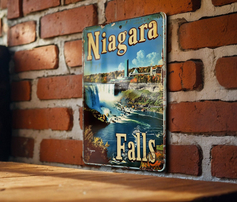 a picture of niagara falls hanging on a brick wall