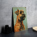 a painting of a dog on a wall next to a plate