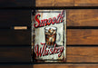 a sign on a wooden bench that says smoothie whiskey