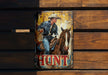a metal sign with a picture of a man on a horse