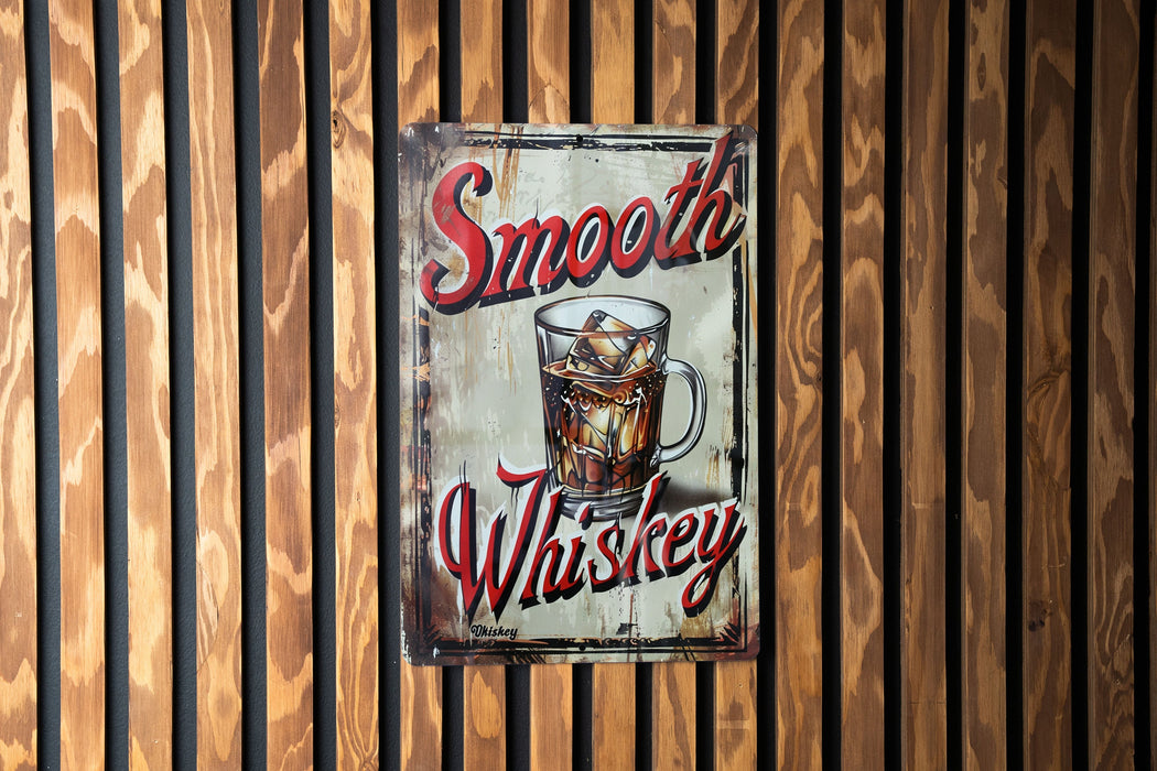 a sign on a wooden wall advertising a drink