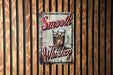 a sign on a wooden wall advertising a drink