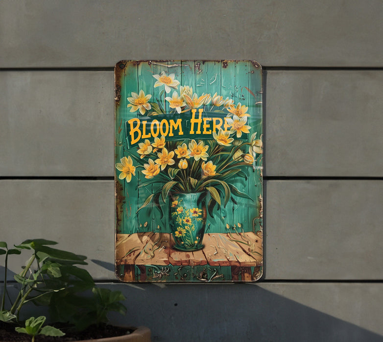a wooden sign with flowers painted on it