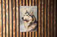 a picture of a dog on a wooden wall