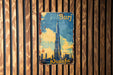 a picture of a burj sign on a wooden wall