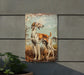 a picture of two dogs on a wall