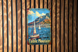 a picture of a table mountain sign on a wooden wall