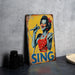 a vintage sing sign with a woman singing into a microphone