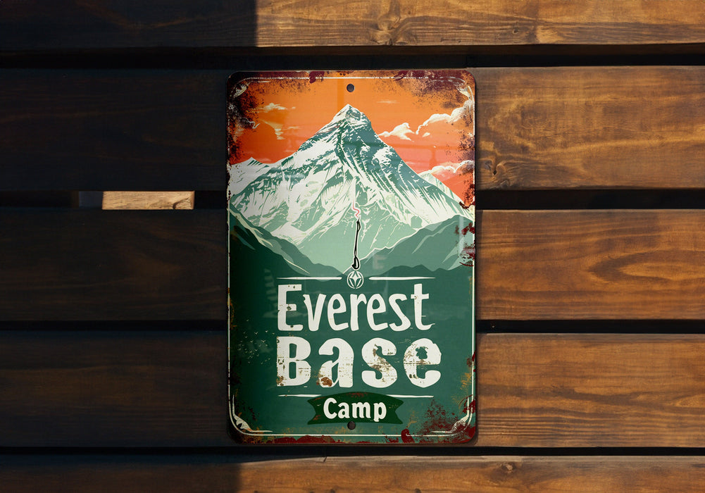a sign on a wooden wall advertising a camp