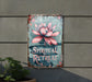 a metal sign with a pink flower on it