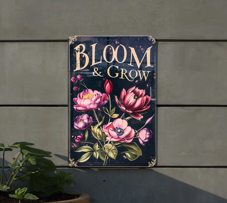 a sign on a wall that says bloom and grow