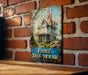 a sign on a brick wall that says fairy tale house