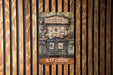 a painting of a country kitchen on a wooden wall