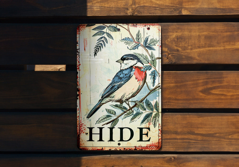 a bird painted on a sign on a wooden wall