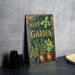 a herb garden sign sitting on top of a table