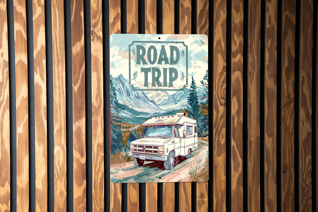 a road trip sign hanging on a wooden wall