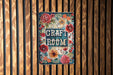 a sign on a wooden wall that says craft room