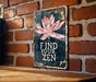 a sign on a brick wall that says find your zen