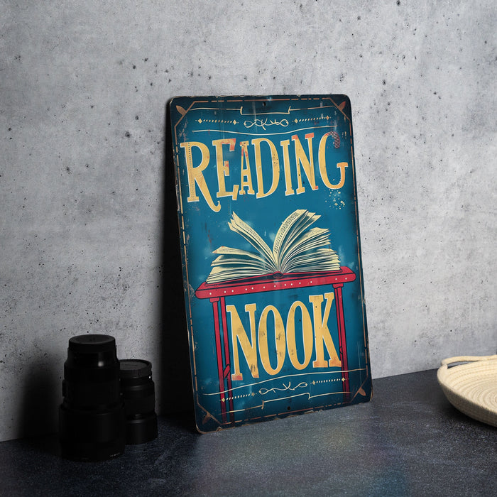 a book sitting on top of a table next to a cup