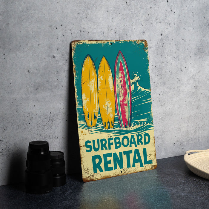 a surfboard rental sign next to a pair of binoculars