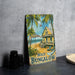a picture of a beach bungalow sign on a table