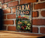 a sign on a brick wall that says farm stand